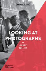 Book cover for Looking at Photographs (Art Essentials)