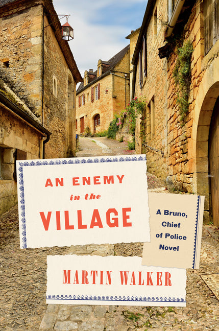 Book cover for Enemy in the Village: A Bruno, Chief of Police Novel