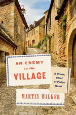 Book cover for Enemy in the Village: A Bruno, Chief of Police Novel