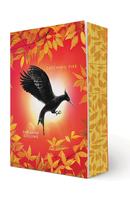 Book cover for Catching Fire: Deluxe Edition (the Hunger Games, Book Two)