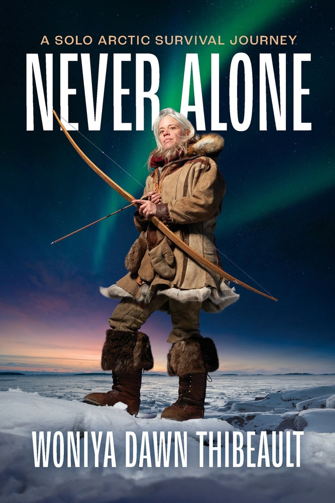Book cover for Never Alone: A Solo Arctic Survival Journey